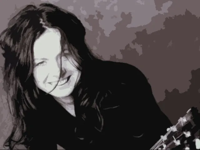 Celeste Carballo de joven con guitarra en mano